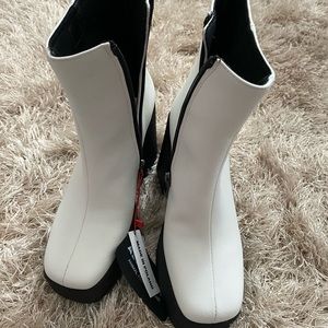 Brand New never worn Altercore brand  white ankle boots! Chunky black sole.